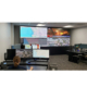 Flying Lion remote pilot monitoring live drone feeds and maps inside a Real-Time Crime Center supporting 24/7 Drone as First Responder operations